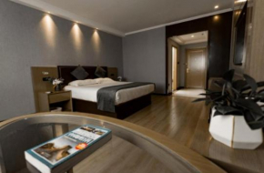 Отель GreenTree Inn Jiangsu Suzhou Changshu Fuchunjiang International Qipeicheng Road Express Hotel  Сучжоу